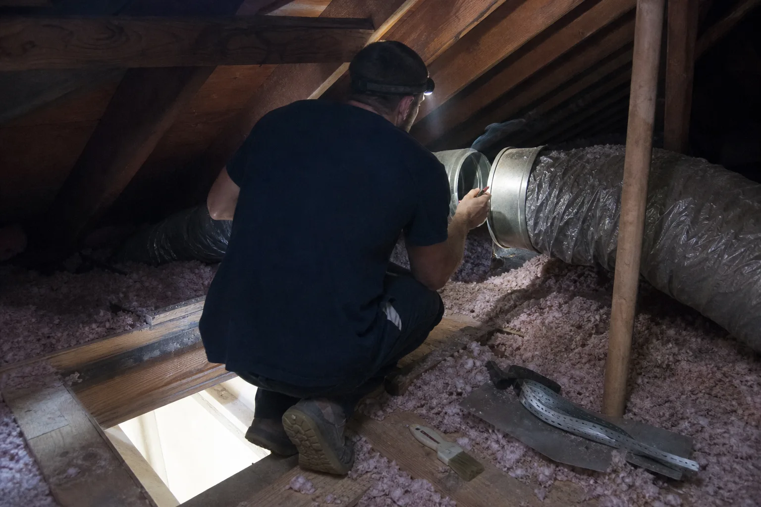 A smoke pencil held at a disconnected attic duct showing air escaping - for Leaking or Disconnected Ducts in Santa Ana, CA